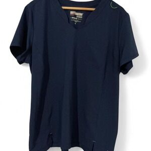 Grey's Anatomy Evolve scrub top in a navy blue colo